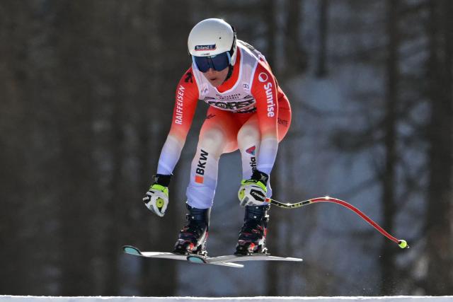 Switzerland's Jasmine Flury competes in the Women's Downhill race of the FIS Ski World Cup at the La Volata slope in the Passo San Pellegrino ski area, Val di Fassa, Italy on March 7, 2026. (Photo by Andreas SOLARO / AFP)