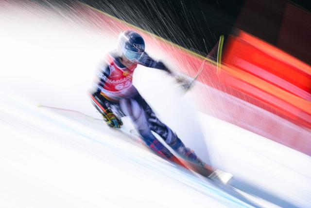 This slow shutter speed photograph shows US' Patrick Kenney competing during the first run of the Men's Giant Slalom event, part of FIS Alpine Ski World Cup 2025-2026 in Kranjska Gora, Slovenia on March 7, 2026. (Photo by Jure Makovec / AFP)