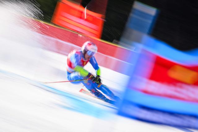 This slow shutter speed photograph shows Italy's Luca de Aliprandini competes during the first run of the Men's Giant Slalom event, part of FIS Alpine Ski World Cup 2025-2026 in Kranjska Gora, Slovenia on March 7, 2026. (Photo by Jure Makovec / AFP)