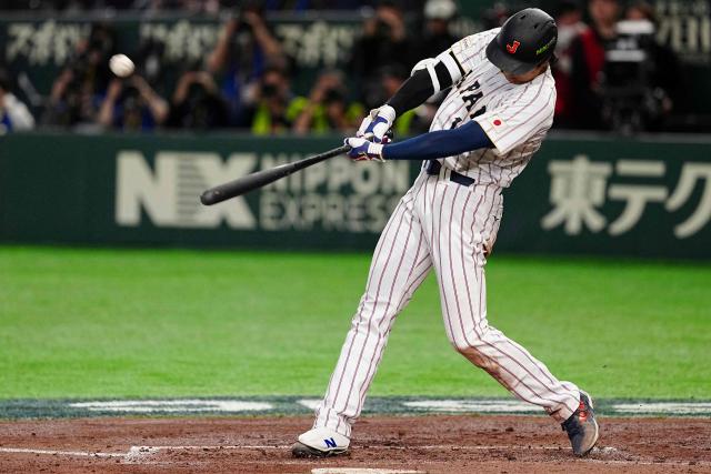 Japan's Shohei Ohtani hits a home run during the World Baseball Classic (WBC) Pool C game between Japan and South Korea at the Tokyo Dome in Tokyo on March 7, 2026. (Photo by Yuichi YAMAZAKI / AFP)