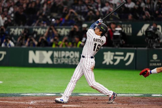 Japan's Shohei Ohtani hits a home run during the World Baseball Classic (WBC) Pool C game between Japan and South Korea at the Tokyo Dome in Tokyo on March 7, 2026. (Photo by Yuichi YAMAZAKI / AFP)