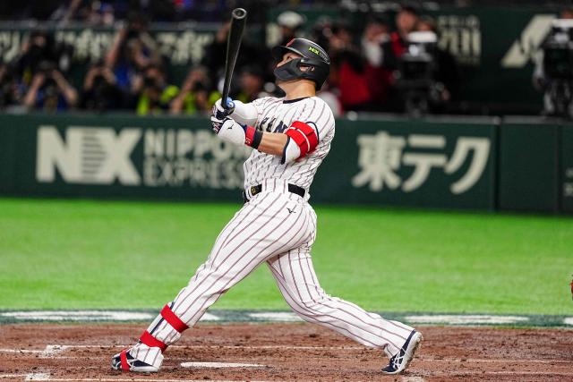 Japan's Seiya Suzuki hits a home run during the World Baseball Classic (WBC) Pool C game between Japan and South Korea at the Tokyo Dome in Tokyo on March 7, 2026. (Photo by Yuichi YAMAZAKI / AFP)