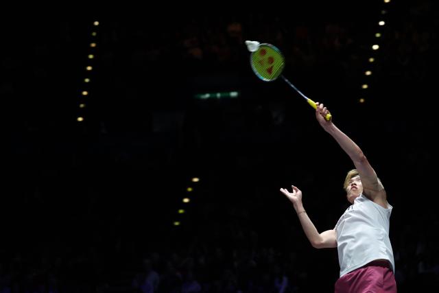 Taiwan's Lin Chun-yi returns against Thailand's Kunlavut Vitidsarn during their men's singles semi-final at the All England Open Badminton Championships at the Utilita Arena in Birmingham, central England, on March 7, 2026. (Photo by Darren Staples / AFP)