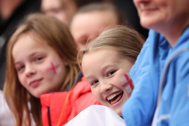 Young fans wait for the start of the Women's FIFA world cup league A, group 3, qualifier football match between England and Iceland at The City Ground in Nottingham, central England on March 7, 2026. (Photo by Chris RADBURN / AFP)