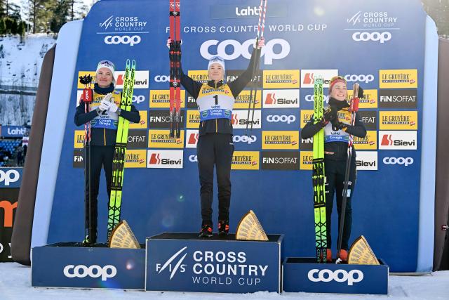 (L-R) Second-placed Linn Svahn of Sweden, winner Jonna Sundling of Sweden and third-placed Coletta Rydzek of Germany celebrate on the podium after the Cross-Country Skiing Women's Sprint Free Style final at the FIS Nordic World Cup Lahti Ski Games in Lahti, Finland, on March 7, 2026. (Photo by Emmi Korhonen / Lehtikuva / AFP) / Finland OUT