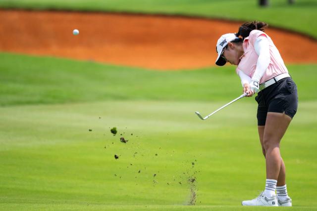 Auston Kim of USA competes during the fourth round of the 2026 LPGA Blue Bay golf tournament at the Jian Lake Blue Bay Golf Club in Lingshui, on China's southern Hainan Island on March 7, 2026. (Photo by CN-STR / AFP) / China OUT