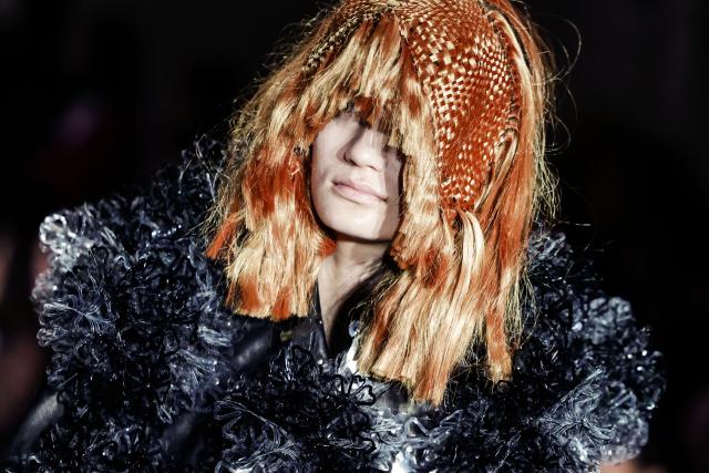A model presents a creation by Noir Kei Ninomiya for the Women's Ready to Wear Fall/Winter 2026-2027 collection fashion show as part of the Paris Women Fashion Week, in Paris, on March 7, 2026. (Photo by STEPHANE DE SAKUTIN / AFP)