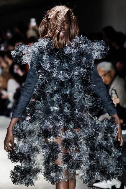A model presents a creation by Noir Kei Ninomiya for the Women's Ready to Wear Fall/Winter 2026-2027 collection fashion show as part of the Paris Women Fashion Week, in Paris, on March 7, 2026. (Photo by STEPHANE DE SAKUTIN / AFP)