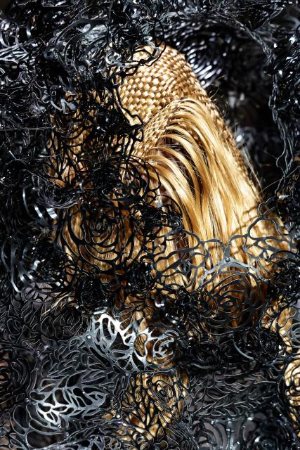 A model presents a creation by Noir Kei Ninomiya for the Women's Ready to Wear Fall/Winter 2026-2027 collection fashion show as part of the Paris Women Fashion Week, in Paris, on March 7, 2026. (Photo by STEPHANE DE SAKUTIN / AFP)