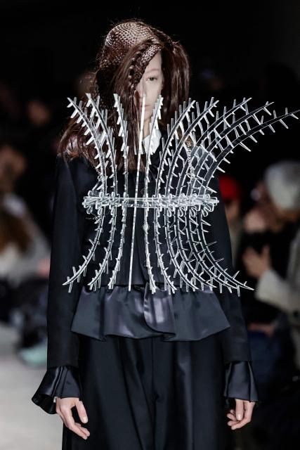 A model presents a creation by Noir Kei Ninomiya for the Women's Ready to Wear Fall/Winter 2026-2027 collection fashion show as part of the Paris Women Fashion Week, in Paris, on March 7, 2026. (Photo by STEPHANE DE SAKUTIN / AFP)