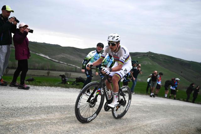 UAE Team Emirates's Slovenian Tadej Pogacar leads during the 20th one-day classic 'Strade Bianche' (White Roads) men's cycling race between Siena and Siena in Tuscany on March 7, 2026. (Photo by Marco BERTORELLO / AFP)