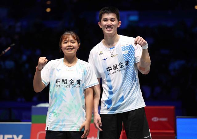 Taiwan’s Ye Hong Wei & Nicole Gonzales celebrate their win against China's Tang Chun Man & Tse Ying Suet during the mixed doubles semi-final at the All England Open Badminton Championships at the Utilita Arena in Birmingham, central England, on March 7, 2026. (Photo by Darren Staples / AFP)