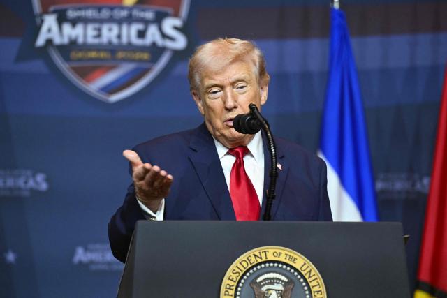 US President Donald Trump speaks during the "Shield of the Americas" Summit at Trump National Doral in Miami, Florida, March 7, 2026. President Trump is hosting a dozen right-wing leaders from Latin America and the Caribbean to discuss issues facing the region, from organized crime to illegal immigration. The summit also aims to serve Washington by boosting US interests in the region and curbing those from foreign powers like China. (Photo by SAUL LOEB / AFP)