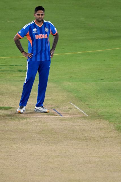 India's captain Suryakumar Yadav looks at the pitch during the training session on the eve of the 2026 ICC Men's T20 Cricket World Cup final match against New Zealand, at the Narendra Modi Stadium in Ahmedabad on March 7, 2026. (Photo by Punit PARANJPE / AFP)