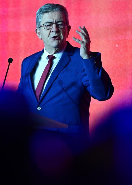 Leader of French left-wing La France Insoumise (LFI) party Jean-Luc Melenchon delivers a speech during an electoral campaign meeting of the local LFI candidate for French municipal elections in Marseille, southern France, on March 7, 2026. French voters head to the polls for municipal elections on March 15 and 22, 2026. (Photo by Miguel MEDINA / AFP)