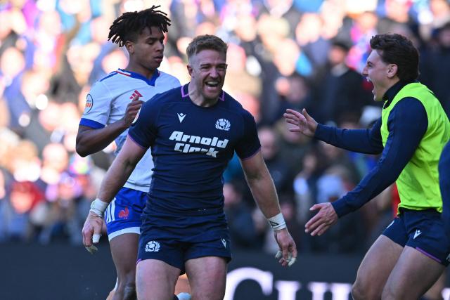 Scotland's wing Kyle Steyn (C) celebrates after scoring their fifth try during the Six Nations international rugby union match between Scotland and France at Murrayfield Stadium in Edinburgh, Scotland on March 7, 2026. (Photo by ANDY BUCHANAN / AFP)