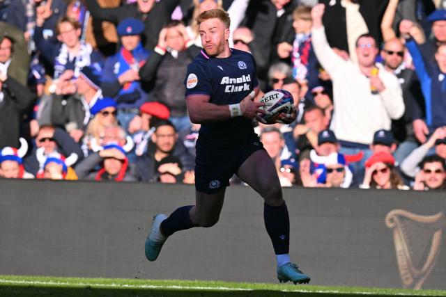 Scotland's wing Kyle Steyn runs in their fifth try during the Six Nations international rugby union match between Scotland and France at Murrayfield Stadium in Edinburgh, Scotland on March 7, 2026. (Photo by ANDY BUCHANAN / AFP)