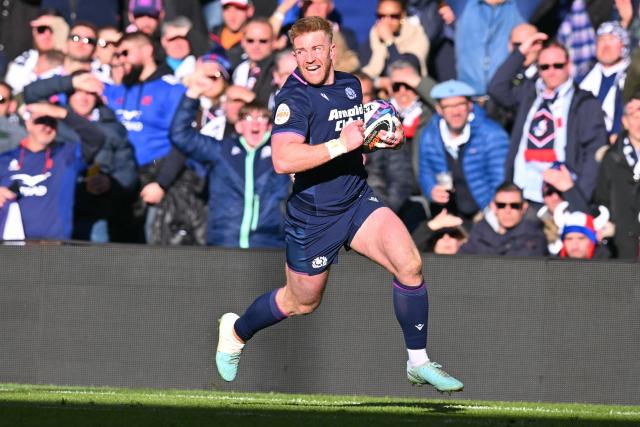 Scotland's wing Kyle Steyn runs in their fifth try during the Six Nations international rugby union match between Scotland and France at Murrayfield Stadium in Edinburgh, Scotland on March 7, 2026. (Photo by ANDY BUCHANAN / AFP)