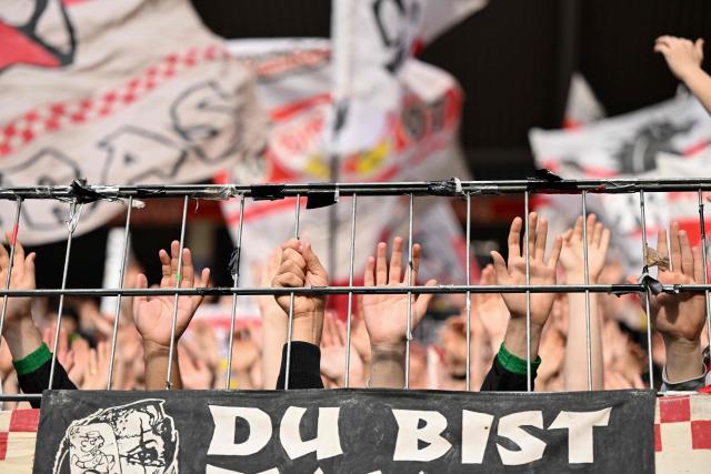 Stuttgart fans are pictured during the German first division Bundesliga football match between 1 FSV Mainz 05 and VfB Stuttgart in Mainz, western Germany on March 7, 2026. (Photo by Kirill KUDRYAVTSEV / AFP) / DFL REGULATIONS PROHIBIT ANY USE OF PHOTOGRAPHS AS IMAGE SEQUENCES AND/OR QUASI-VIDEO
