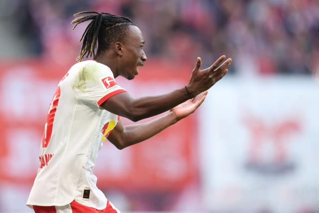 Leipzig's Ivorian forward #49 Yan Diomande reacts during the Bundesliga football match between RB Leipzig and Augsburg in Leipzig, eastern Germany, on March 7, 2026. (Photo by Ronny HARTMANN / AFP) / DFL REGULATIONS PROHIBIT ANY USE OF PHOTOGRAPHS AS IMAGE SEQUENCES AND/OR QUASI-VIDEO