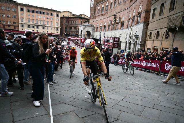 Team Visma | Lease a Bike TVL's Belgian Wout Van Aert rides after crossing the finish line of the 20th one-day classic 'Strade Bianche' (White Roads) men's cycling race between Siena and Siena in Tuscany on March 7, 2026. (Photo by Marco BERTORELLO / AFP)