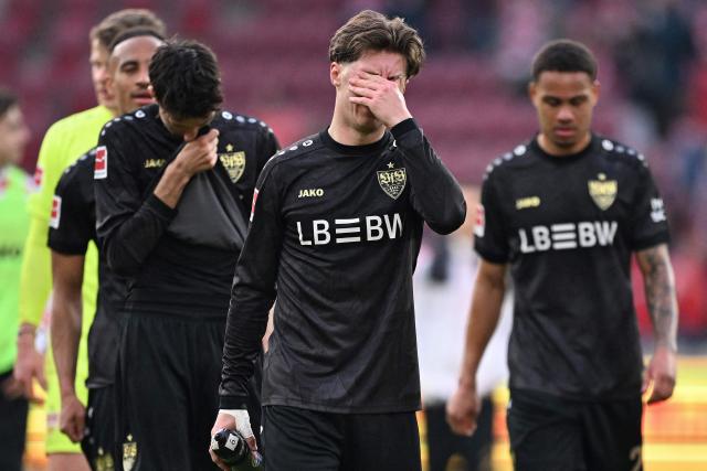 Stuttgart's players including German midfielder #06 Angelo Stiller (C) react after the German first division Bundesliga football match between 1 FSV Mainz 05 and VfB Stuttgart in Mainz, western Germany on March 7, 2026. (Photo by Kirill KUDRYAVTSEV / AFP) / DFL REGULATIONS PROHIBIT ANY USE OF PHOTOGRAPHS AS IMAGE SEQUENCES AND/OR QUASI-VIDEO