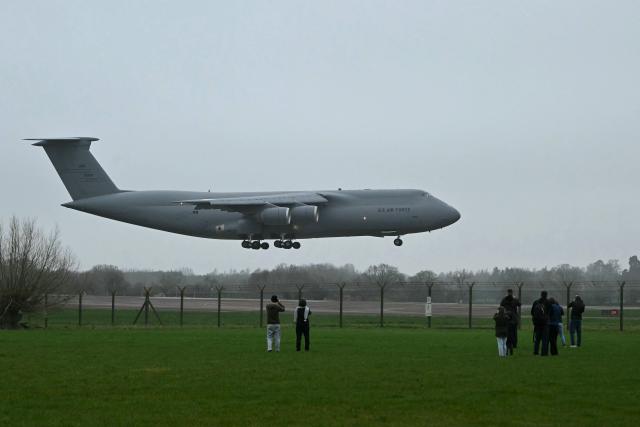 A US Air Force C-5 Galaxy lands at RAF Fairford in south west England on March 6, 2026. Britain's Prime Minister Keir Starmer finally gave his approval on March 1, for Washington to use the bases of Diego Garcia in the Indian Ocean and Fairford in southwest England to bomb Iranian missile sites, after several Gulf countries were targeted by Iranian retaliations. (Photo by JUSTIN TALLIS / AFP)