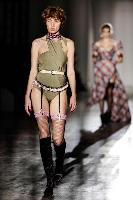 A model presents a creation for Vivienne Westwood for the Women's Ready to Wear Fall/Winter 2026-2027 collection fashion show as part of the Paris Women Fashion Week, in Paris, on March 7, 2026. (Photo by STEPHANE DE SAKUTIN / AFP)