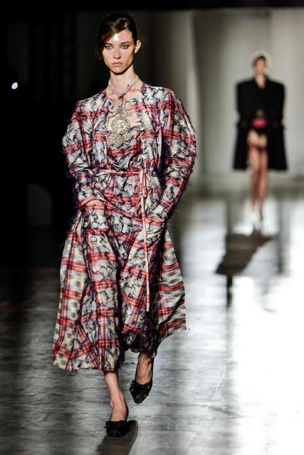 A model presents a creation for Vivienne Westwood for the Women's Ready to Wear Fall/Winter 2026-2027 collection fashion show as part of the Paris Women Fashion Week, in Paris, on March 7, 2026. (Photo by STEPHANE DE SAKUTIN / AFP)