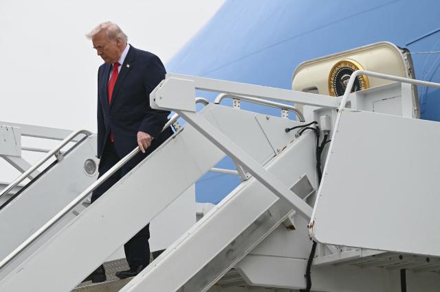 US President Donald Trump disembarks from Air Force One upon arrival at Dover Air Force Base in Dover, Delaware, March 7, 2026, to attend a Dignified Transfer Ceremony. Six US Army soldiers were killed March 1 when an Iranian drone struck a key US command center in Kuwait's southern industrial hub of Port Shuaiba, a day after the United States and Israel launched a sweeping military campaign against Iran. (Photo by SAUL LOEB / AFP)