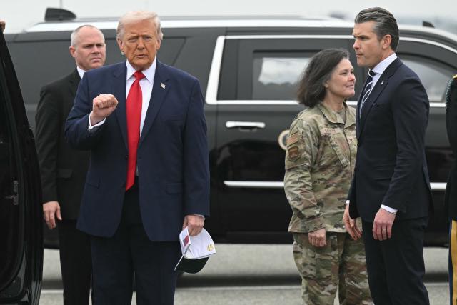 US President Donald Trump and Defense Secretary Pete Hegseth arrive at Dover Air Force Base in Dover, Delaware, March 7, 2026, to attend a Dignified Transfer Ceremony. Six US Army soldiers were killed March 1 when an Iranian drone struck a key US command center in Kuwait's southern industrial hub of Port Shuaiba, a day after the United States and Israel launched a sweeping military campaign against Iran. (Photo by SAUL LOEB / AFP)