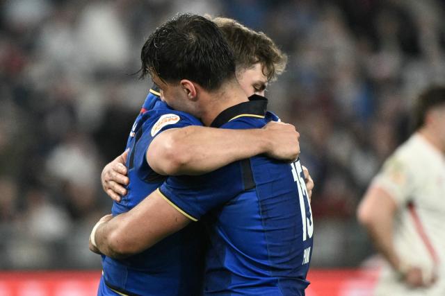 Italy's centre Leonardo Marin (L) celebrates after scoring a try with Italy's full-back Lorenzo Pani during the Six Nations international rugby union match between Italy and England at the Stadio Olimpico in Rome, on March 7, 2026. (Photo by Tiziana FABI / AFP)