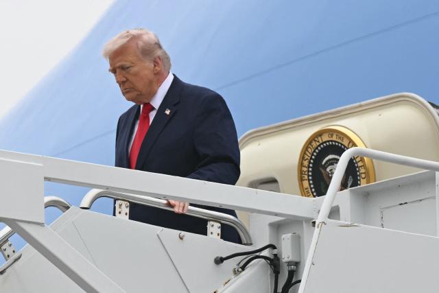 US President Donald Trump disembarks from Air Force One upon arrival at Dover Air Force Base in Dover, Delaware, March 7, 2026, to attend a Dignified Transfer Ceremony. Six US Army soldiers were killed March 1 when an Iranian drone struck a key US command center in Kuwait's southern industrial hub of Port Shuaiba, a day after the United States and Israel launched a sweeping military campaign against Iran. (Photo by SAUL LOEB / AFP)