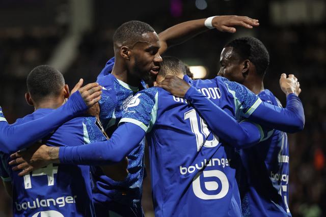 Marseille's English forward #10 Mason Greenwood (2nd R) celebrates with team mates after scoring his team first goal during the French L1 football match between Toulouse FC and Olympique de Marseille (OM) at the TFC Stadium in Toulouse, southwestern France, on March 7, 2026. (Photo by Valentine CHAPUIS / AFP)