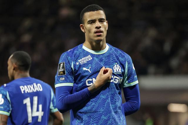 Marseille's English forward #10 Mason Greenwood gestures after scoring his team first goal during the French L1 football match between Toulouse FC and Olympique de Marseille (OM) at the TFC Stadium in Toulouse, southwestern France, on March 7, 2026. (Photo by Valentine CHAPUIS / AFP)