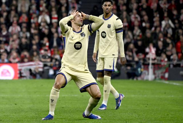 Barcelona's Portuguese defender #02 Joao Cancelo reacts during the Spanish league football match between Athletic Club Bilbao and FC Barcelona at San Mames Stadium in Bilbao on March 7, 2026. (Photo by ANDER GILLENEA / AFP)