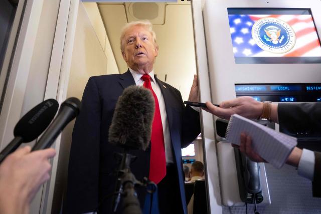 US President Donald Trump speaks with the media aboard Air Force One during a flight from Dover, Delaware, to Miami, Florida, on March 7, 2026. (Photo by SAUL LOEB / AFP)