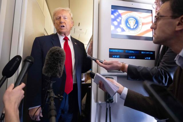US President Donald Trump speaks with the media aboard Air Force One during a flight from Dover, Delaware, to Miami, Florida, on March 7, 2026. (Photo by SAUL LOEB / AFP)