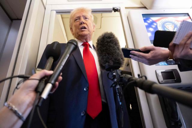 US President Donald Trump speaks with the media aboard Air Force One during a flight from Dover, Delaware, to Miami, Florida, on March 7, 2026. (Photo by SAUL LOEB / AFP)