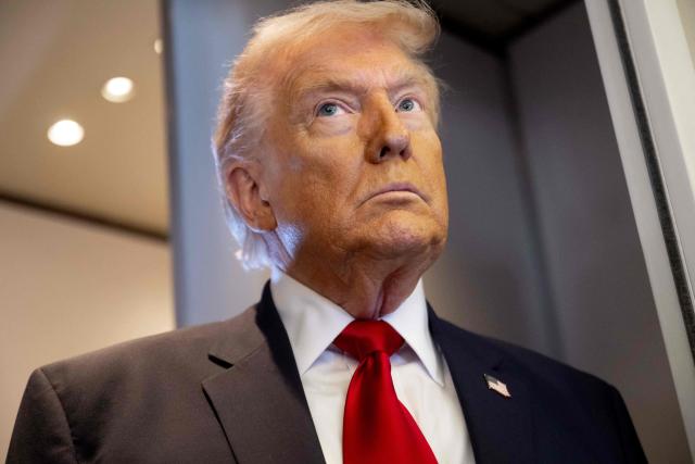 US President Donald Trump speaks with the media aboard Air Force One during a flight from Dover, Delaware, to Miami, Florida, on March 7, 2026. (Photo by SAUL LOEB / AFP)