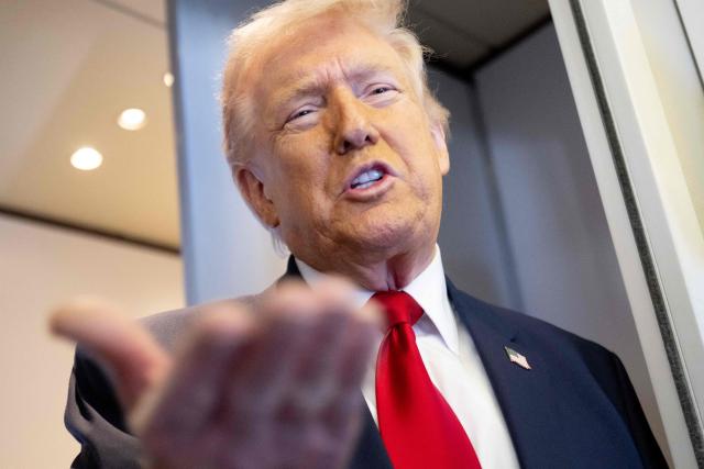 US President Donald Trump speaks with the media aboard Air Force One during a flight from Dover, Delaware, to Miami, Florida, on March 7, 2026. (Photo by SAUL LOEB / AFP)