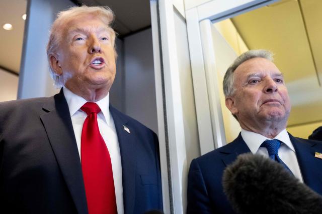 US President Donald Trump speaks with the media as special envoy Steve Witkoff (R) looks on aboard Air Force One during a flight from Dover, Delaware, to Miami, Florida, on March 7, 2026. (Photo by SAUL LOEB / AFP)