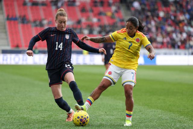 Manuela Paví #7 of Colombia controls the ball past Emily Sonnett #14 of the United States during the SheBelieves Cup match between the United States and Colombia at the Sports Illustrated Stadium in Harrison, New Jersey, on March 7, 2026. (Photo by ANGELA WEISS / AFP)