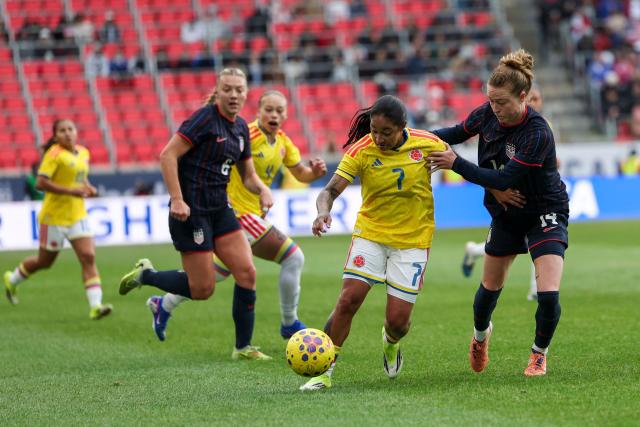 Emily Sonnett #14 of the United States vies with Manuela Paví #7 of Colombia during the SheBelieves Cup match between the United States and Colombia at the Sports Illustrated Stadium in Harrison, New Jersey, on March 7, 2026. (Photo by ANGELA WEISS / AFP)