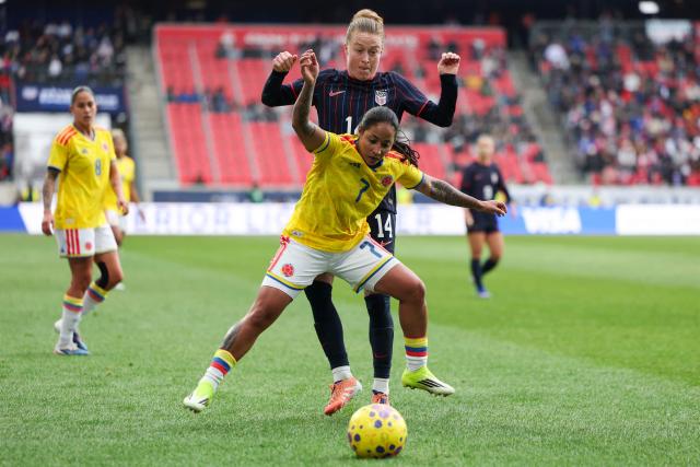 Emily Sonnett #14 of the United States vies with Manuela Paví #7 of Colombia during the SheBelieves Cup match between the United States and Colombia at the Sports Illustrated Stadium in Harrison, New Jersey, on March 7, 2026. (Photo by ANGELA WEISS / AFP)