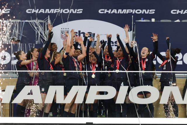 The USWNT hold up the SheBelieves Cup while celebrating after their 1-0 victory against Colombia at Sports Illustrated Stadium on March 7, 2026 in Harrison, New Jersey. (Photo by ANGELA WEISS / AFP)