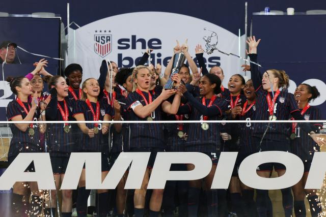 The USWNT hold up the SheBelieves Cup while celebrating after their 1-0 victory against Colombia at Sports Illustrated Stadium on March 7, 2026 in Harrison, New Jersey. (Photo by ANGELA WEISS / AFP)