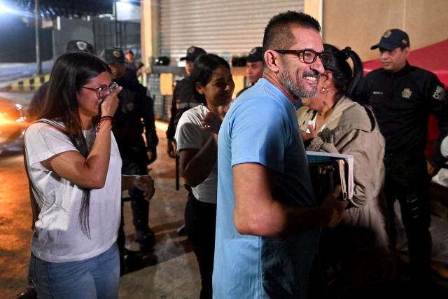 A Venezuelan prisoner smiles after being released from the Bolivarian National Police (PNB) Zone 7 prison in Caracas on February 21, 2026. (Photo by Juan BARRETO / AFP)