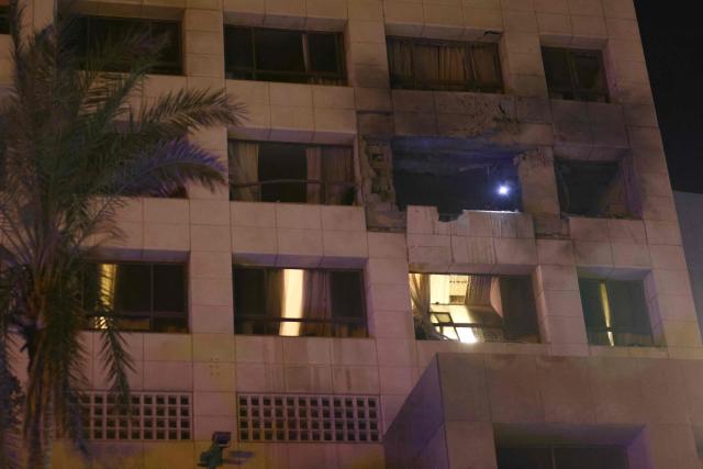 First aid responders inspect a Ramada hotel room targeted by an Israeli strike, in Beirut’s seaside Rawche area, on March 8, 2026. (Photo by Ibrahim AMRO / AFP)