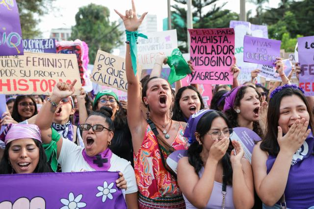 Demonstrators take part in a march on the eve of International Women's Day in Lima on March 7, 2026. (Photo by Connie FRANCE / AFP)